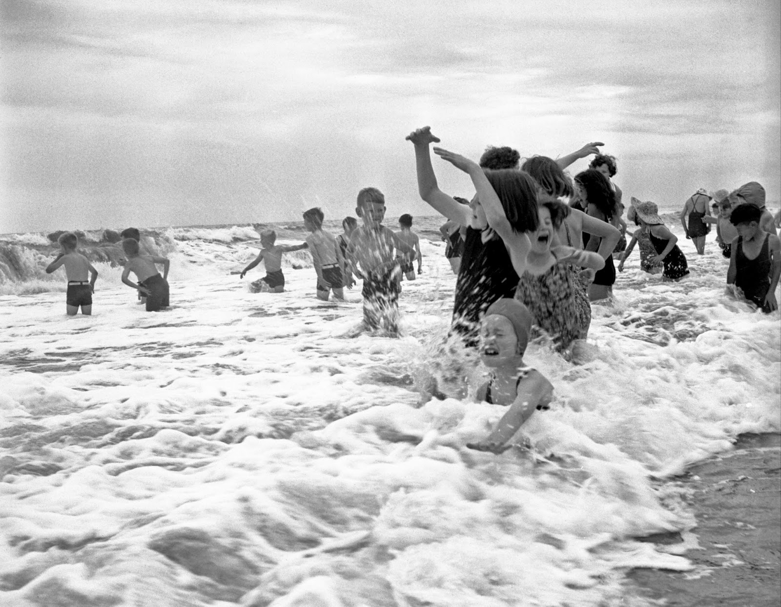 Children from the Otaki Health Camp playing in the sea, 1945