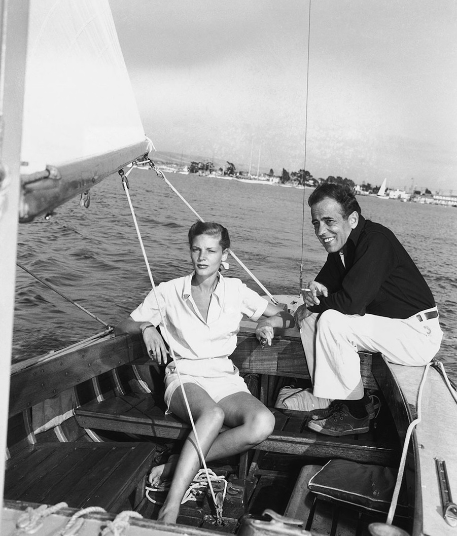 humphrey-bogart-1899-1957-and-lauren-bacall-aboard-the-santana-a-55-foot-16-ton-yawl-the-bogarts-kept-the-santana-at-newport-beach-next-to-lauren-bacall-the-santana-was-the-great-l